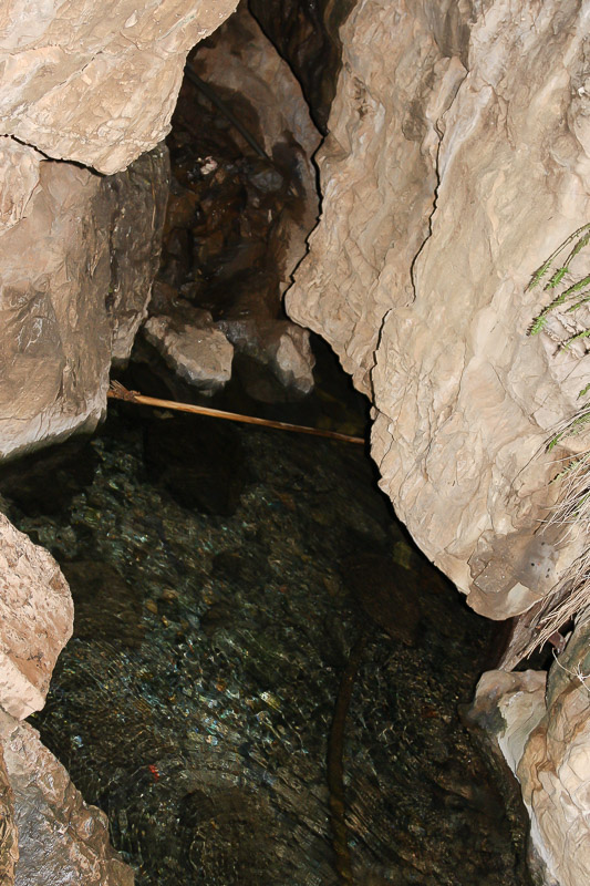 The water emerges between these rocks